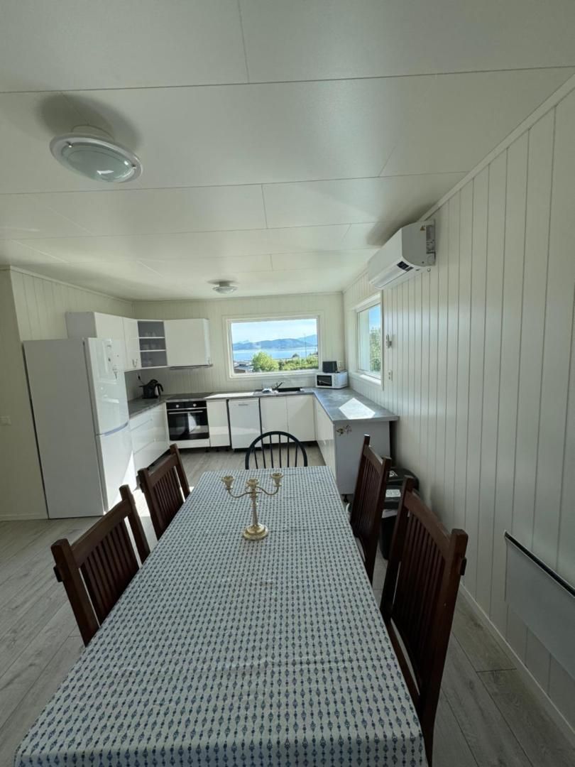 Kitchen and dining table with the view beyond