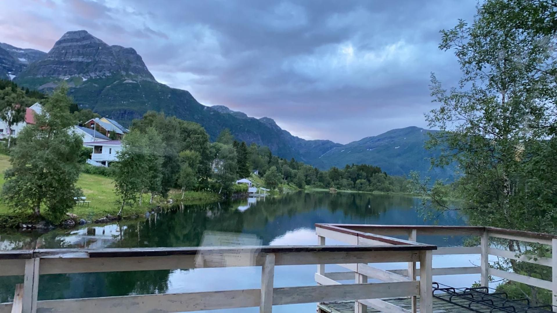 The deck over the lake with the mountains behind